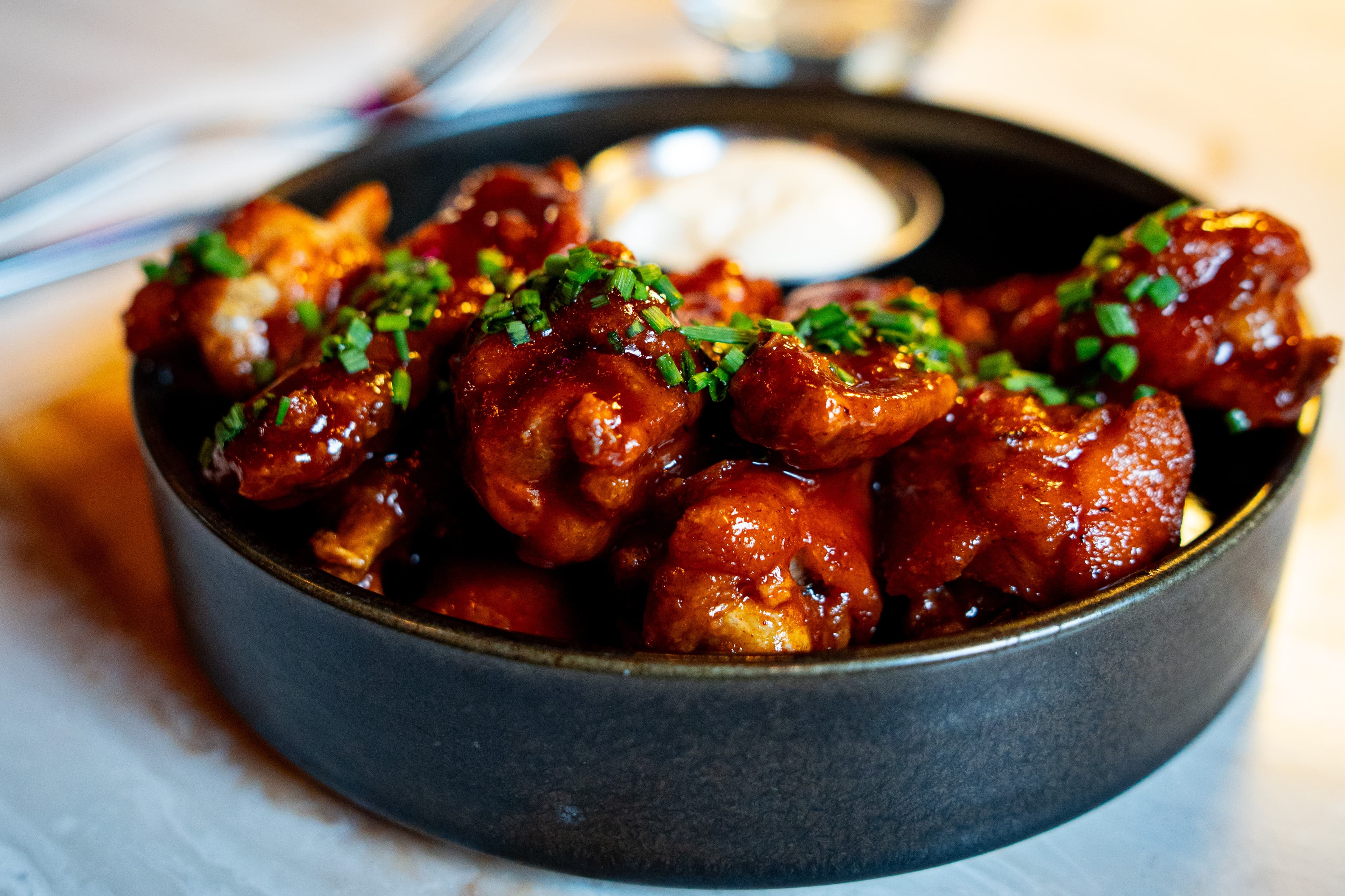 Signature chicken wings in sauce