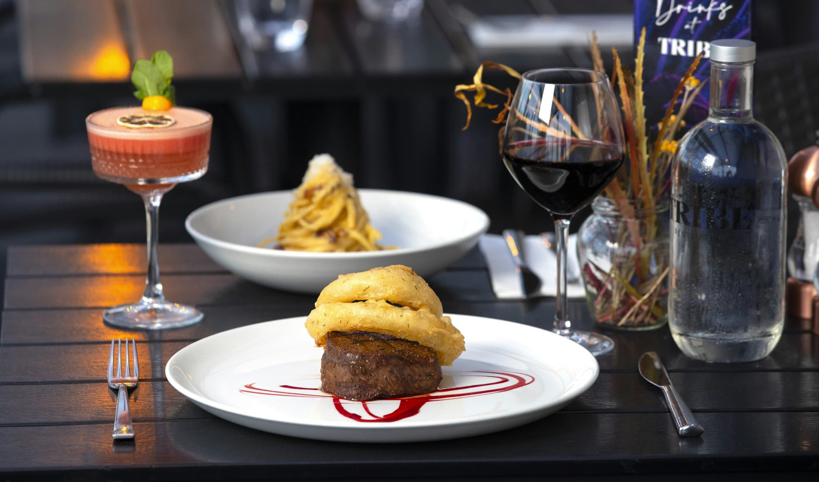 Steak cooked to perfection with sides